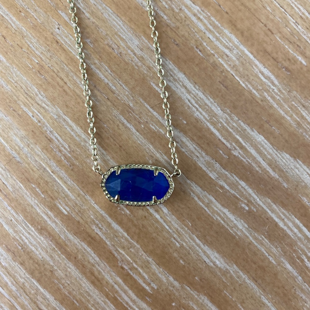 Kendra Scott necklace.